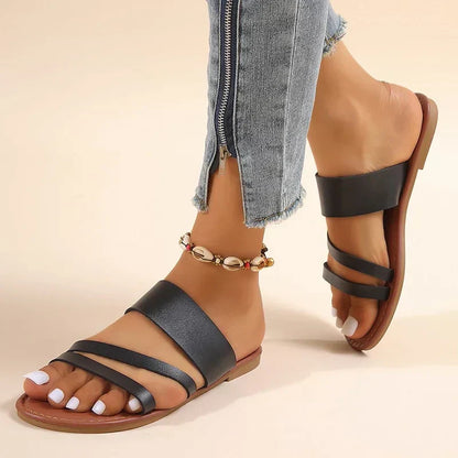 Flache, lässige und bequeme Sandalen
